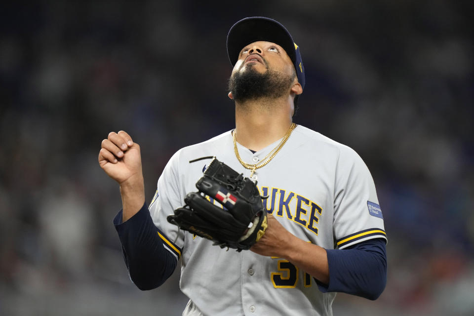 Milwaukee Brewers relief pitcher Joel Payamps walks to the dugout after being relieved during the eighth inning of a baseball game against the Miami Marlins, Saturday, Sept. 23, 2023, in Miami. (AP Photo/Lynne Sladky)