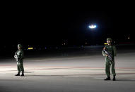 <p>Soldiers stand guard ahead of the arrival of U.S. President Donald Trump at Paya Lebar Air Base in Singapore, before his summit with North Korean leader Kim Jong Un, June 10, 2018. (Photo: Kim Kyung-Hoon/Reuters) </p>