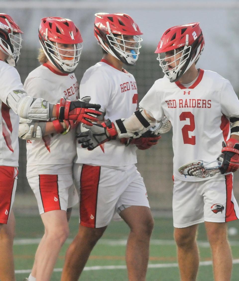 Pal-Mac players celebrate a goal during Tuesday's Class C final against Honeoye Falls-Lima.