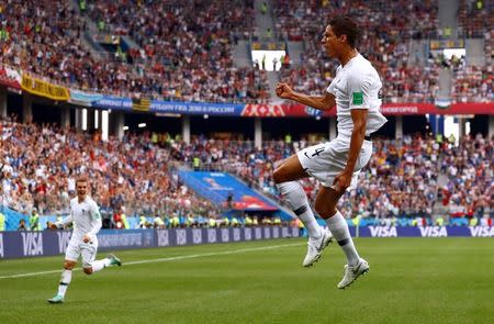 Soccer Football - World Cup - Quarter Final - Uruguay vs France - Nizhny Novgorod Stadium, Nizhny Novgorod, Russia - July 6, 2018 France's Raphael Varane celebrates scoring their first goal REUTERS/Jason Cairnduff