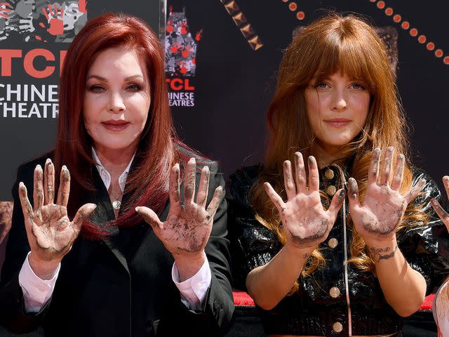 <p>Jon Kopaloff/Getty</p> Priscilla Presley and Riley Keough at the Handprint Ceremony honoring Priscilla Presley, Lisa Marie Presley and Riley Keough at the TCL Chinese Theatre in June 2022.