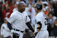 DETROIT, MI - OCTOBER 13: Delmon Young #21 of the Detroit Tigers celebrates with Jhonny Peralta #27 after hitting a solo home run in the fourth inning of Game Five of the American League Championship Series against the Texas Rangers at Comerica Park on October 13, 2011 in Detroit, Michigan. (Photo by Harry How/Getty Images)