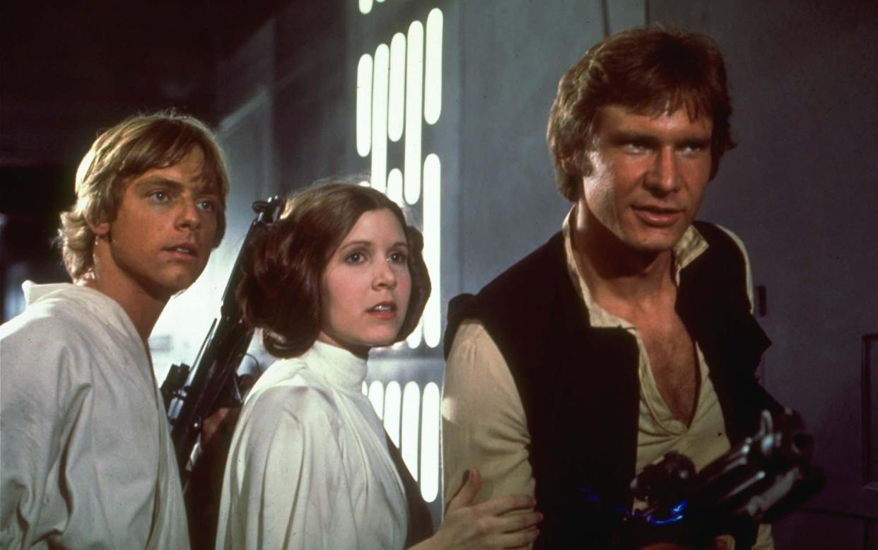 Mark Hamill, Carrie Fisher and Harrison Ford in Star Wars: A New Hope - AP