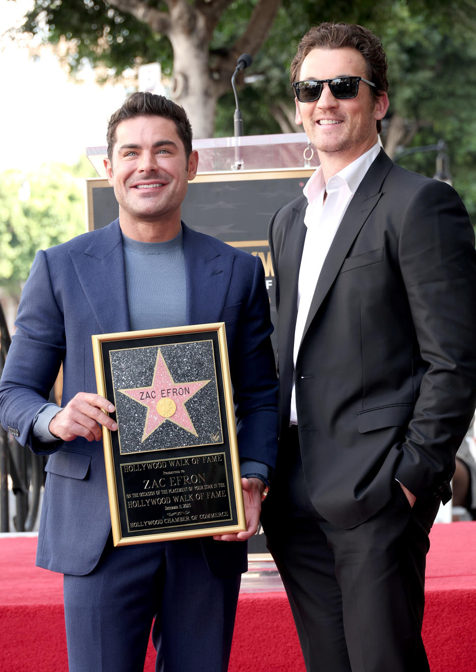 Closeup of Zac Efron and Miles Teller