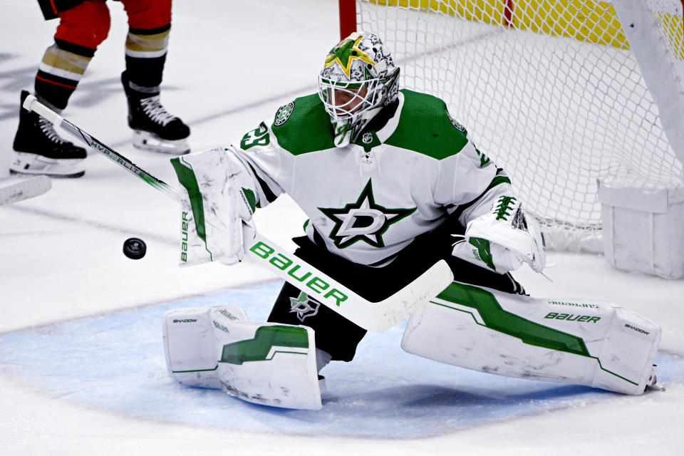 Dallas Stars goaltender Jake Oettinger blocks a shot by the Anaheim Ducks during the third period of an NHL hockey game in Anaheim, Calif., Friday, March 8, 2024. (AP Photo/Alex Gallardo)