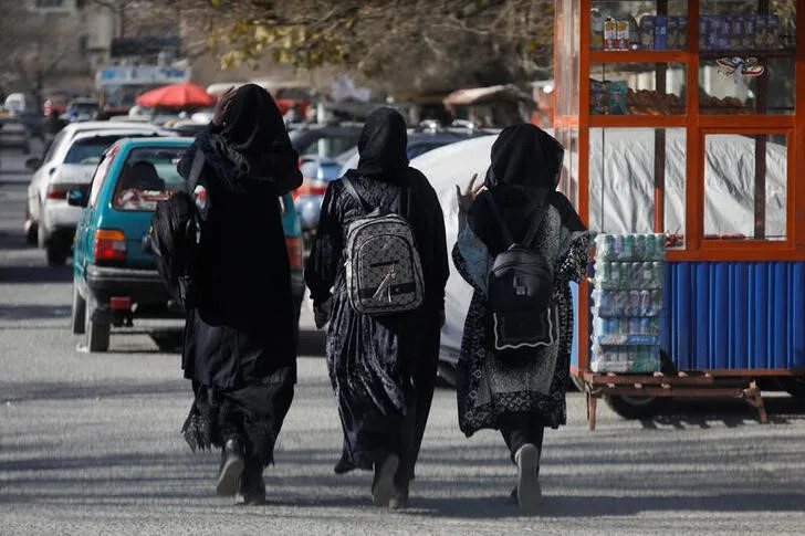 Women are turned away from Afghan universities after Taliban ban