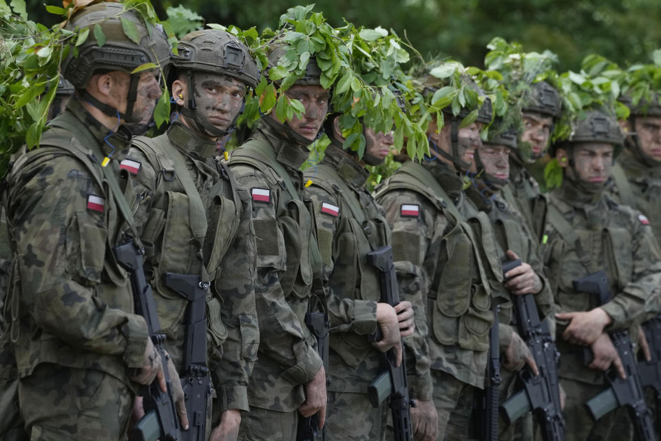 Volunteers takes part in basic training with the Polish army in Nowogrod, Poland, on Thursday June 20, 2024. The volunteers are taking part in summer training program called "Holidays with the Army." Despite the name, it is actually serious military training in combat, shooting and other skills as Poland seeks for new recruits for its growing army, mindful of Russia's revived imperial ambitions. (AP Photo/Czarek Sokolowski)