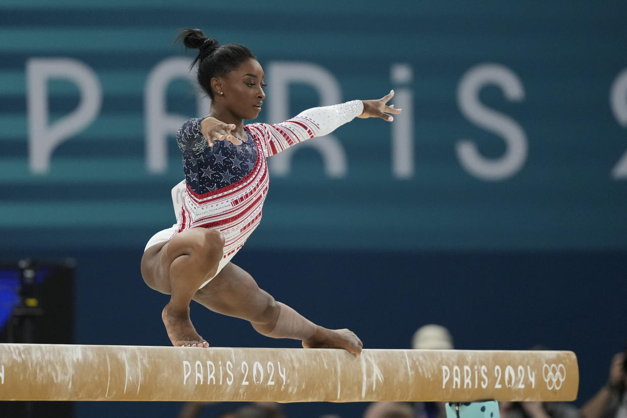 Simone Biles on the balance beam. 