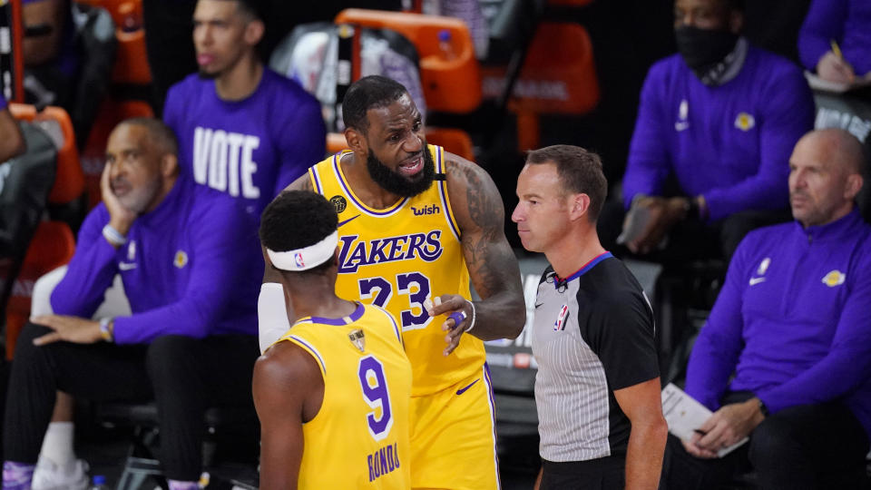 Los Angeles Lakers' LeBron James (23) argues a call during the second half of Game 1 of basketball's NBA Finals Wednesday, Sept. 30, 2020, in Lake Buena Vista, Fla. (AP Photo/Mark J. Terrill)