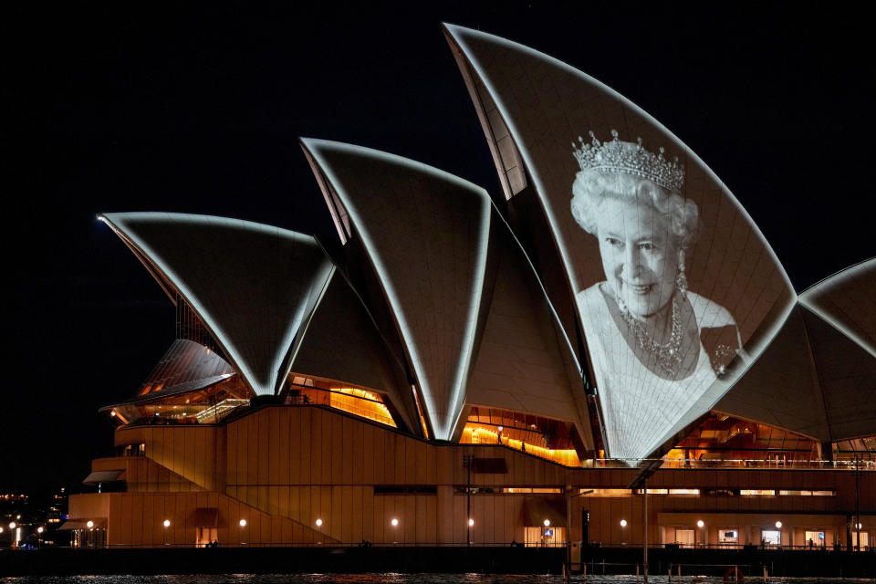 The Sydney Opera House is illuminated with a portrait of Queen Elizabeth II in Sydney, Australia, Sept. 9, 2022. (AP Photo/Mark Baker)