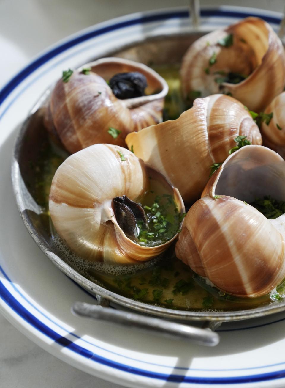 Escargot from Sottise, a trendy French restaurant that's part wine bar, part vintage music venue in Phoenix.