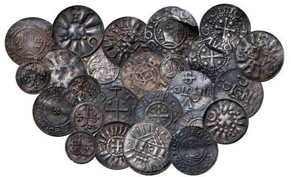 In this undated image made available on Thursday May 16, 2013 show coins from Bohemia, Germany, Denmark and England discovered during an archaeological dig last year Danish museum officials said that an archaeological dig last year has revealed 365 items from the Viking era, including 60 rare coins. (AP Photo/Polfoto/Stokke Brothers)  <a href="http://www.huffingtonpost.com/2013/05/16/michael-strokbro-larsen-danish-teen-viking-era-find_n_3285583.html" target="_blank">Read more here</a>