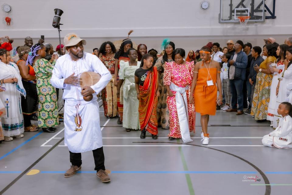 Members of Calgary's Ugandan community show off their fashion at the Genesis Centre on Saturday. 