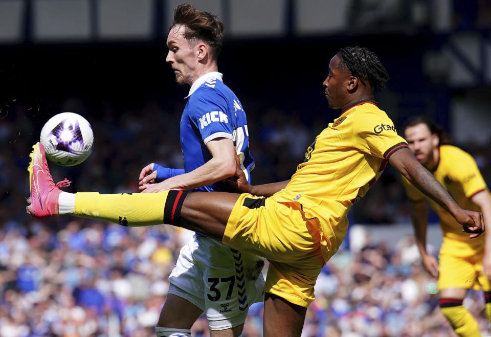 Everton's James Garner, left and Sheffield United's Andre Brooks vie for the ball during the English Premier League soccer match between Everton and Sheffield United, at Goodison Park, in Liverpool, England, Saturday May 11, 2024. (Peter Byrne/PA via AP)