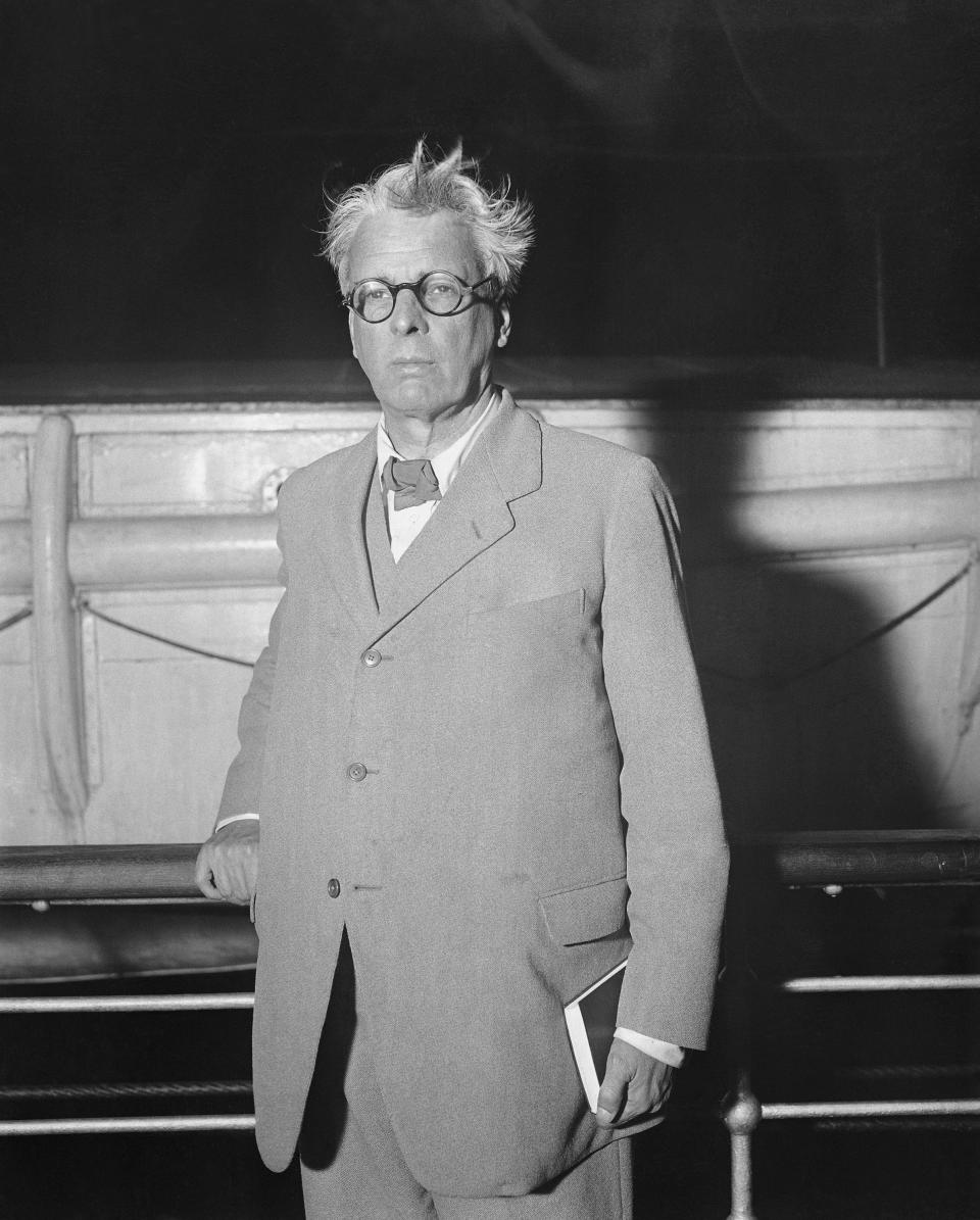 FILE - William Butler Yeats, Irish Poet and statesman, is photographed aboard the S.S. Europe as he arrives in New York, Oct. 26, 1932. Yeats was in New York for the opening of his one-act play," The Words Upon the Window Pane." Evan Osnos, whose biography “Joe Biden” came out in 2020, says that President Joe Biden began memorizing Yeats as a teenager working to overcome his stutter. He would stand in front of a mirror and speak lines from Yeats and Ralph Waldo Emerson, straining to avoid the contortion of his face muscles. (AP Photo, File)