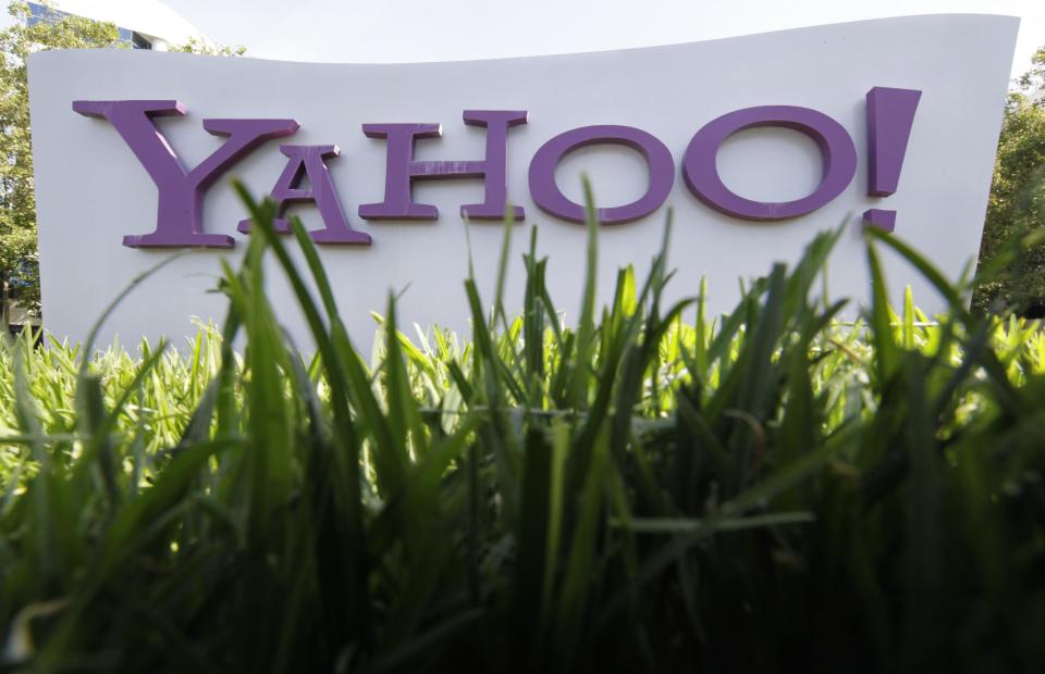 FILE - In this May 20, 2012 file photo, a Yahoo sign stands outside the company's offices in Santa Clara, Calif. Yahoo’s restless shareholders let interim CEO Ross Levinsohn know that they won’t give him much time to turn the company around if he gets the job on a permanent basis at Yahoo’s annual shareholders meeting Thursday. July 12, 2012. (AP Photo/Paul Sakuma, File)