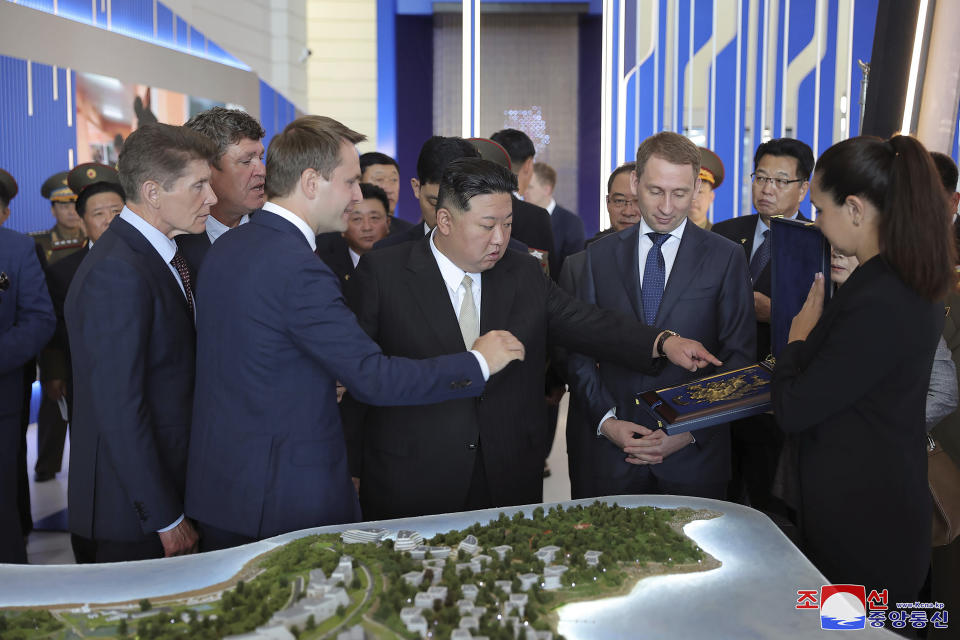 In this photo provided by the North Korean government, North Korea leader Kim Jong Un, center, visits the Far Eastern Federal University in Russky Island, Vladivostok, Russian Far East Sunday, Sept. 17, 2023. Independent journalists were not given access to cover the event depicted in this image distributed by the North Korean government. The content of this image is as provided and cannot be independently verified. Korean language watermark on image as provided by source reads: "KCNA" which is the abbreviation for Korean Central News Agency. (Korean Central News Agency/Korea News Service via AP)