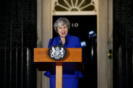 Britain's Prime Minister Theresa May makes a statement following winning a confidence vote, after Parliament rejected her Brexit deal, outside 10 Downing Street in London, Britain, January 16, 2019. REUTERS/Henry Nicholls