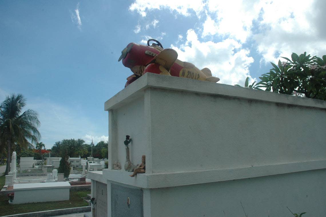 June 28, 2007: by Cammy Clark / Miami Herald Staff -- At the Key West Cemetery, the miniature airplane adorns the top of the vault of Adam Arnold, who was learning to be a pilot when he was killed by hit-and-run drivers at age 16 in 1996.