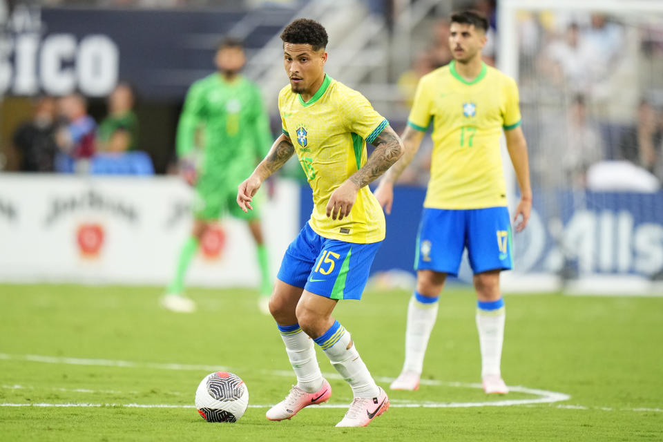 ORLANDO, FLORIDA - JUNE 12: João Gomes #15 of Brazil controls the ball against the United States during the Continental Clasico 2024 game at Camping World Stadium on June 12, 2024 in Orlando, Florida. (Photo by Rich Storry/Getty Images)