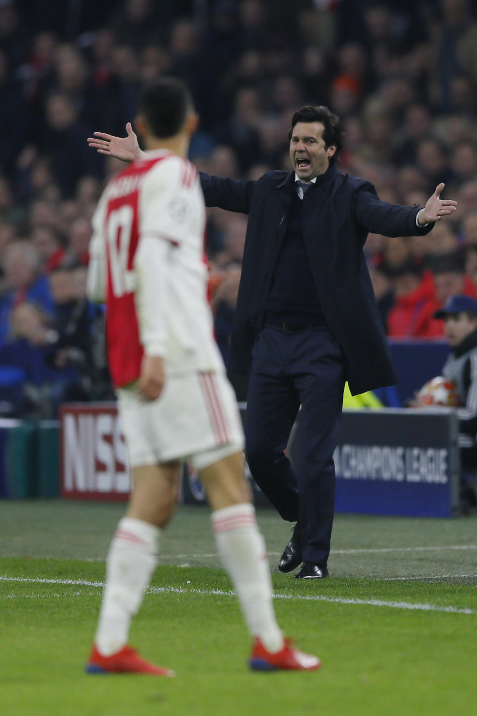 Real coach Santiago Solari gestures during the first leg, round of sixteen, Champions League soccer match between Ajax and Real Madrid at the Johan Cruyff ArenA in Amsterdam, Netherlands, Wednesday Feb. 13, 2019. (AP Photo/Peter Dejong)