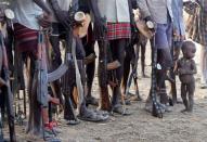 The Wider Image: When raiders menace in northern Kenya, grab your guns