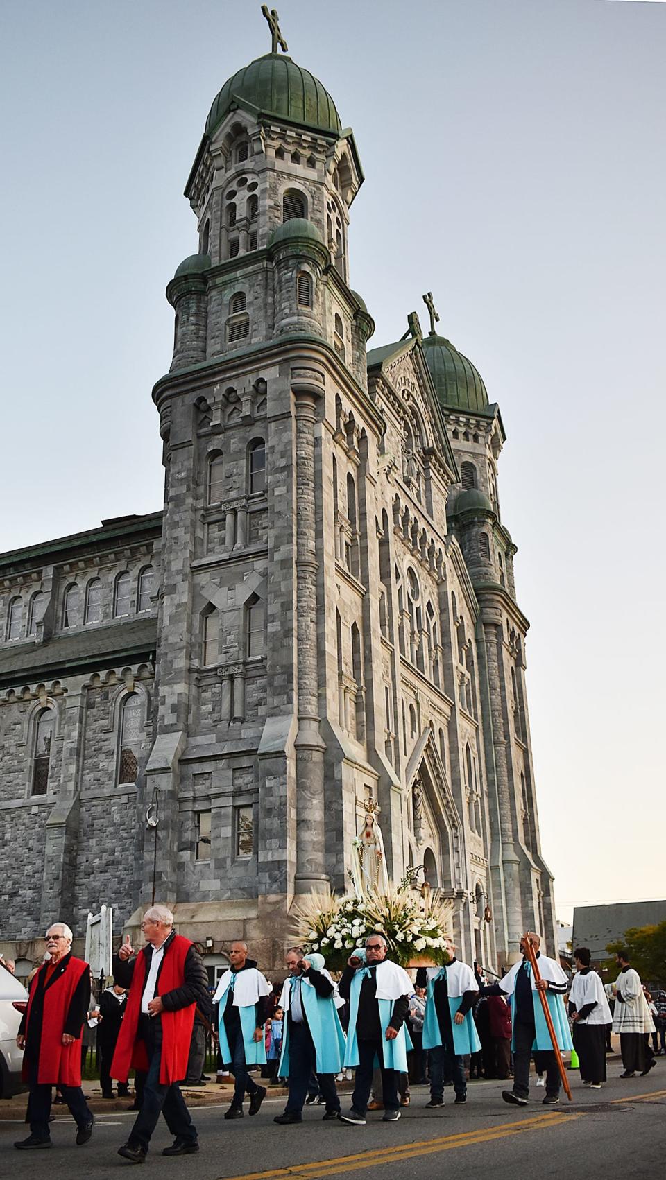 Procession for Peace makes its way past St. Anne's Church in Fall River on Monday, Oct. 10, 2022.