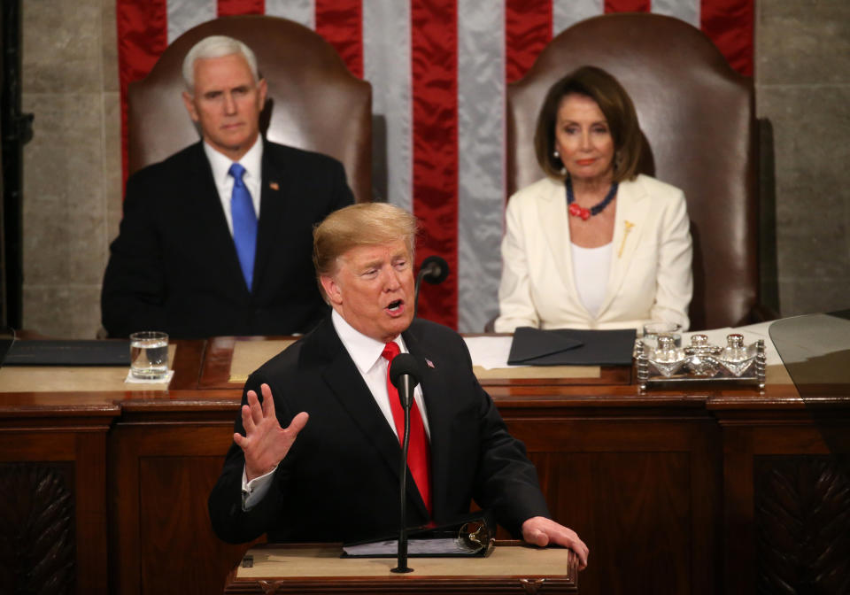 Vice President Mike Pence and Speaker of the House Nancy Pelosi (D-CA) listen as U.S. President Donald Trump delivers his second State of the Union address to a joint session of the U.S. Congress in the House Chamber of the U.S. Capitol on Capitol Hill in Washington, U.S. February 5, 2019. REUTERS/Leah Millis