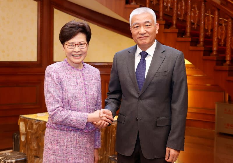 Hong Kong's Chief Executive Carrie Lam meets Chinese Minister of Science and Technology Wang Zhigang in Beijing, China in this handout picture released by Hong Kong Information Services Department