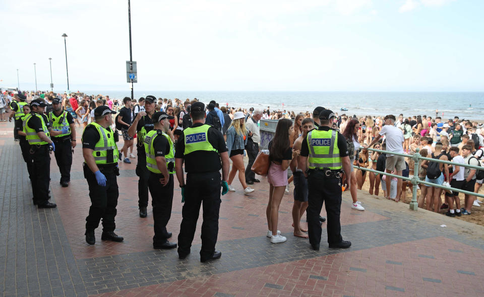 Police at Portobello Beach in Edinburgh where they broke up large crowds who flocked to the beach to make the most of the good weather.