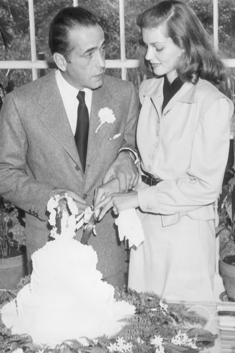 <p>Even though Lauren Bacall is an old-Hollywood actress known for her sultry looks, she skipped the big white dress and wore a beige skirt-suit and black leather belt for her wedding to Humphrey Bogart (who also happened to be 25 years her senior).</p>