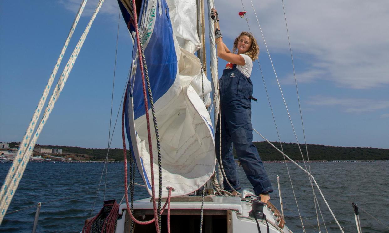 <span>Sailing by… Susan Smillie on board her trusty Nicholson 26.</span><span>Photograph: Cat Vinton</span>