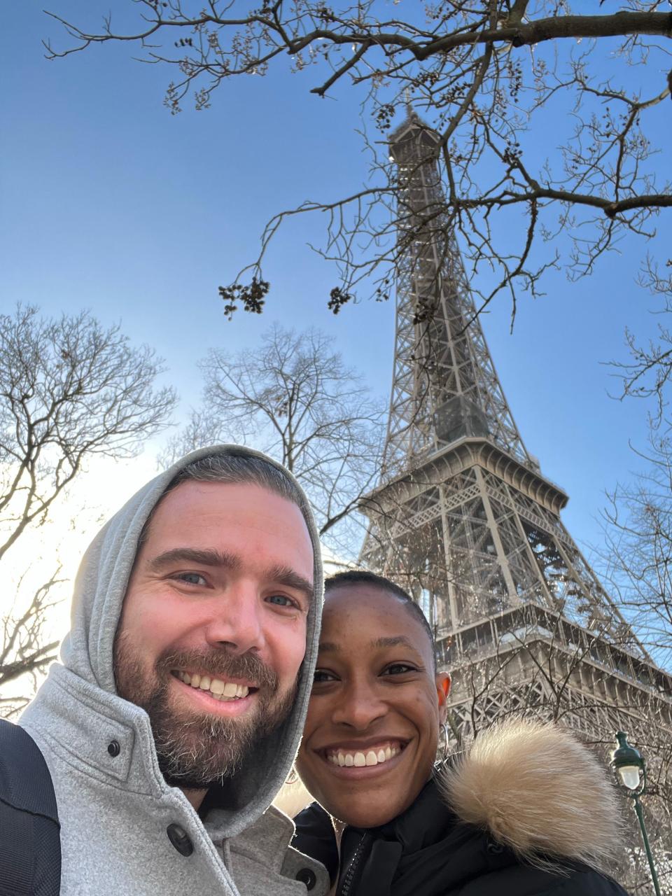 Gabriel Solberg and Krystina Burton by the Eiffel Tower in Paris.
