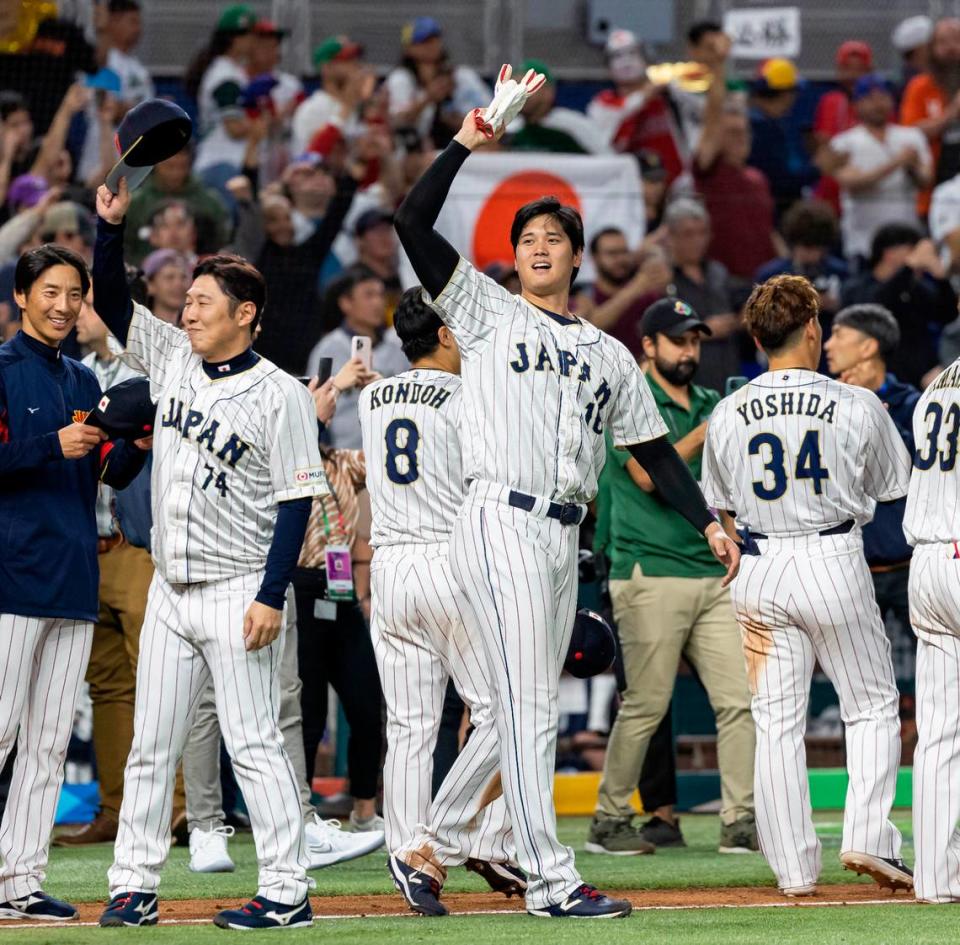 Japan pitcher Shohei Ohtani (16) waves to the crowd after defeating Mexico 6 to 5 during their semifinal game at the World Baseball Classic at loanDepot Park on Monday, March 20, 2023, in Miami, Fla.