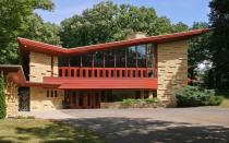 <p>From the mid 1930s onward, Wright built ‘Usonian Homes,’ with the Elam House being the largest example of this style. Usonian houses were known for, among other characteristics, having large cantilevered roofs and were L-shaped to fit in within the existing natural landscape or garden. Elam house is mostly windows—over a hundred to be exact—and the whole structure rests on giant limestone piers. It’s an impressive home, with five bedrooms and six baths, and is available to rent for $275 per night. <a rel="nofollow noopener" href="http://theelamhouse.com/" target="_blank" data-ylk="slk:theelamhouse.com;elm:context_link;itc:0;sec:content-canvas" class="link ">theelamhouse.com</a></p>