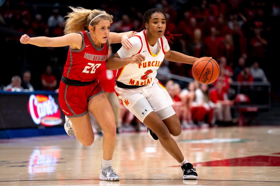 Purcell Marian guard Dee Alexander, right, is the reigning Ohio Ms. Basketball and the unanimous choice by USA Today Network Ohio for the top-ranked girls basketball player in the state.