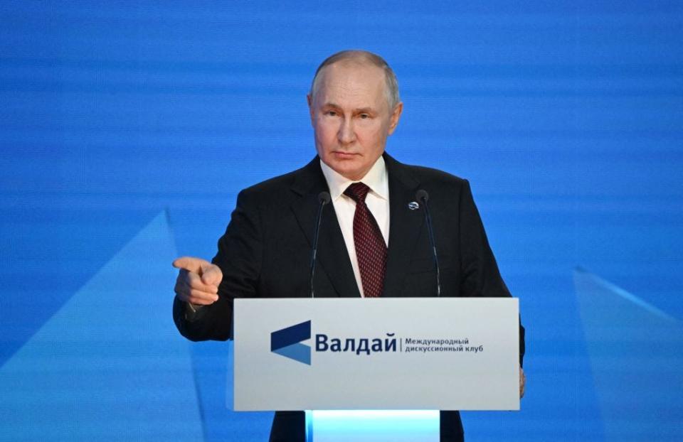 This pool photograph distributed by Russian state owned agency Sputnik shows Russian President Vladimir Putin addressing the plenary session of the Valdai Discussion Club forum in Sochi on October 5, 2023.