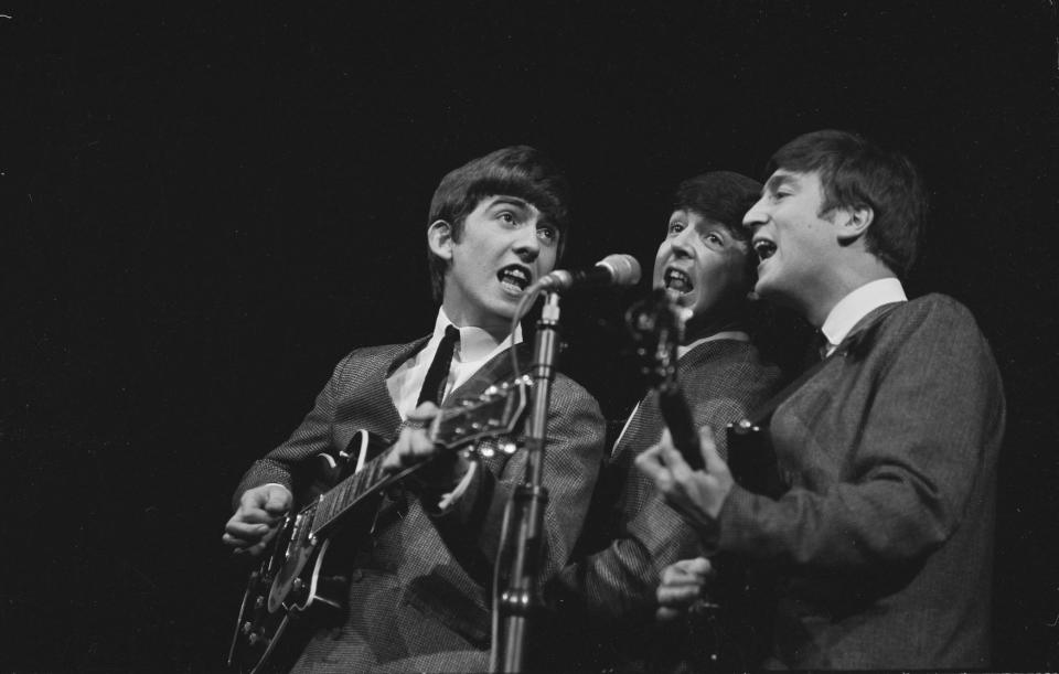 George Harrison, Paul McCartney, and John Lennon performing on the BBC's Swinging Sound from the Royal Albert Hall in 1963. (BBC)