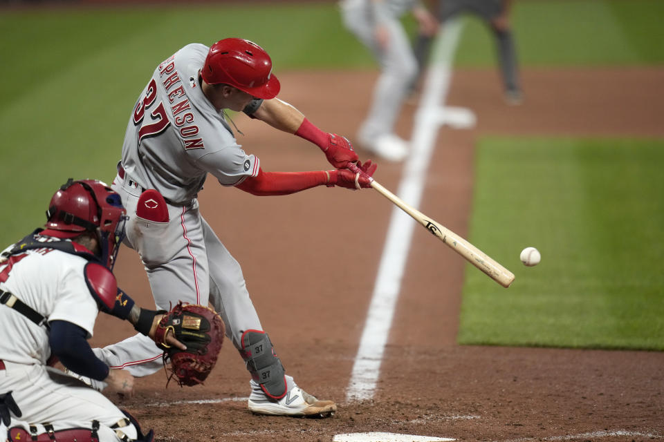 Cincinnati Reds' Tyler Stephenson hits an RBI single during the ninth inning of a baseball game against the St. Louis Cardinals Friday, June 4, 2021, in St. Louis. (AP Photo/Jeff Roberson)