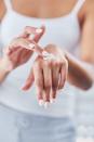 <p>Take a few more seconds each morning to apply SPF to the backs of your hands, your neck, and your ears. “These are common spots for several kinds of skin cancer, so it’s vital not to miss them,” says Dr. Perez.</p>