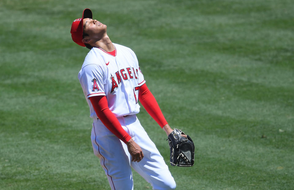 ANAHEIM, CA - AUGUST 02:  Shohei Ohtani #17 of the Los Angeles Angels reacts after giving up a bases loaded walk scoring Michael Brantley #23 of the Houston Astros in the second inning of the game at Angel Stadium of Anaheim on August 2, 2020 in Anaheim, California. (Photo by Jayne Kamin-Oncea/Getty Images)