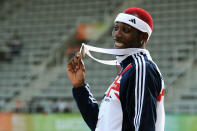 BARCELONA, SPAIN - JULY 30: Phillips Idowu of Great Britain receives the gold medal in the Mens Triple Jump during day four of the 20th European Athletics Championships at the Olympic Stadium on July 30, 2010 in Barcelona, Spain. (Photo by Jasper Juinen/Getty Images)