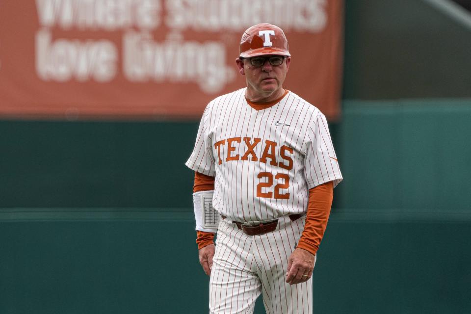 Texas head coach David Pierce takes the field at third base during a game against Indiana at UFCU Disch-Falk Field in February.