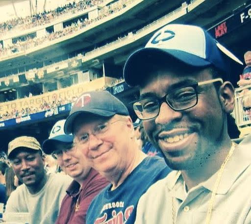 Philando Castile with some of his coworkers from J.J. Hill at a baseball game. (Photo: Courtesy of John Horton)