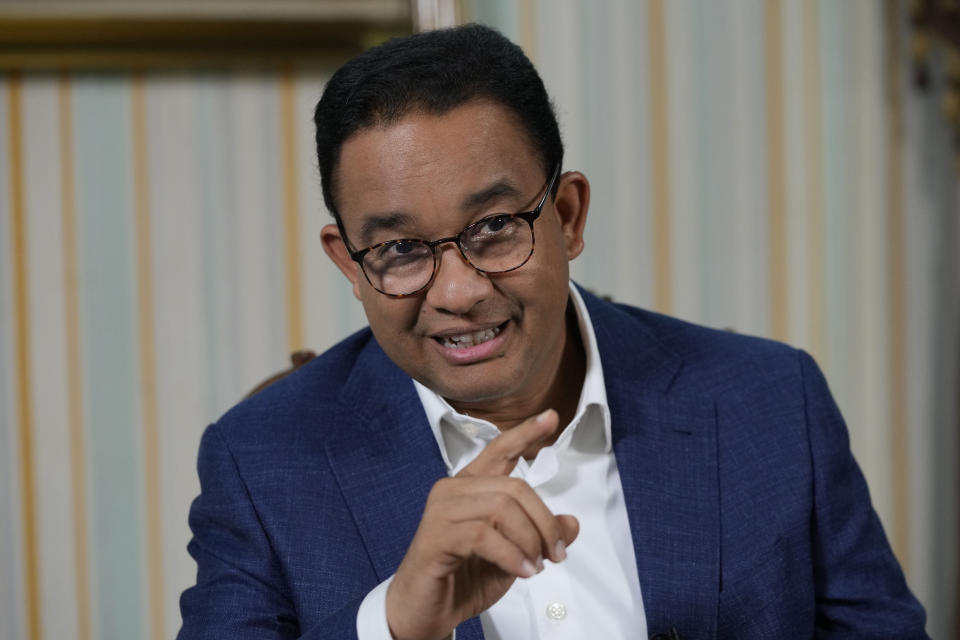 Presidential candidate Anies Baswedan gestures as he speaks during an interview with The Associated Press on the sidelines of his campaign rally in Bandar Lampung Timur, Indonesia, Sunday, Jan. 14, 2024. The former Jakarta governor seeking Indonesia's presidency said democracy is declining in the country and pledged to make changes to get it back on track. (AP Photo/Achmad Ibrahim)