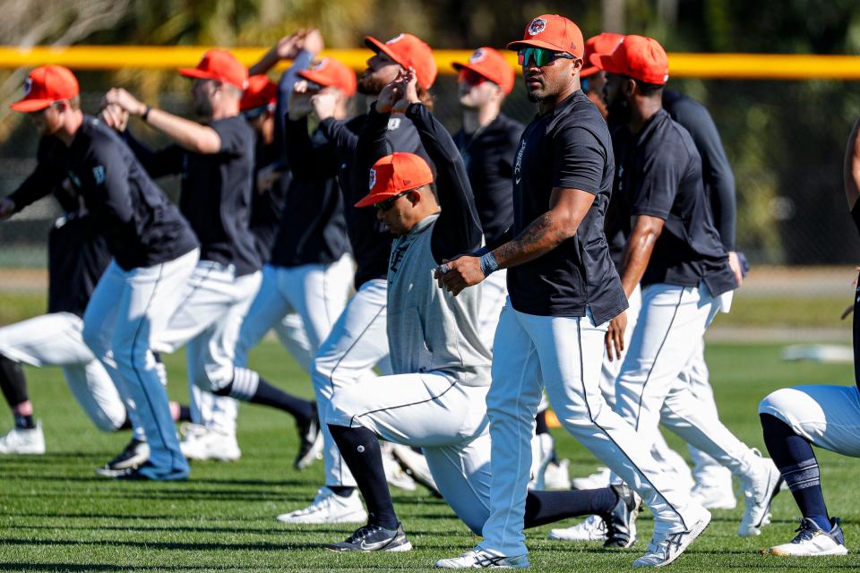 Detroit Tigers players warm up during spring training at TigerTown in Lakeland, Fla. on Tuesday, Feb. 20, 2024.