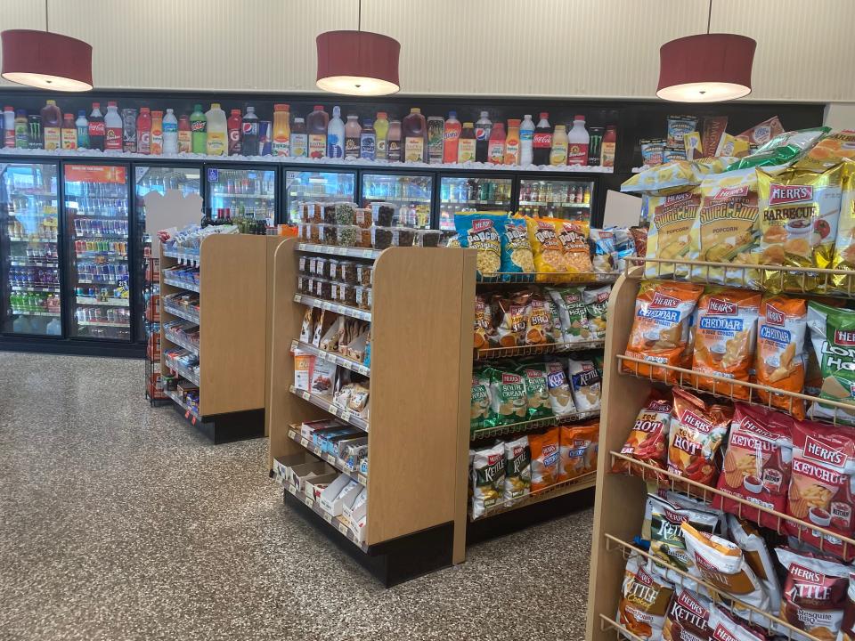 Aisles of snacks and refrigerator section at Wawa