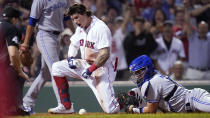 Boston Red Sox's Jarren Duran celebrates after scoring on his RBI triple and an error by the Toronto Blue Jays during the fourth inning of the second baseball game of a doubleheader at Fenway Park, Wednesday, July 28, 2021, in Boston. At right is Blue Jays catcher Reese McGuire. (AP Photo/Charles Krupa)