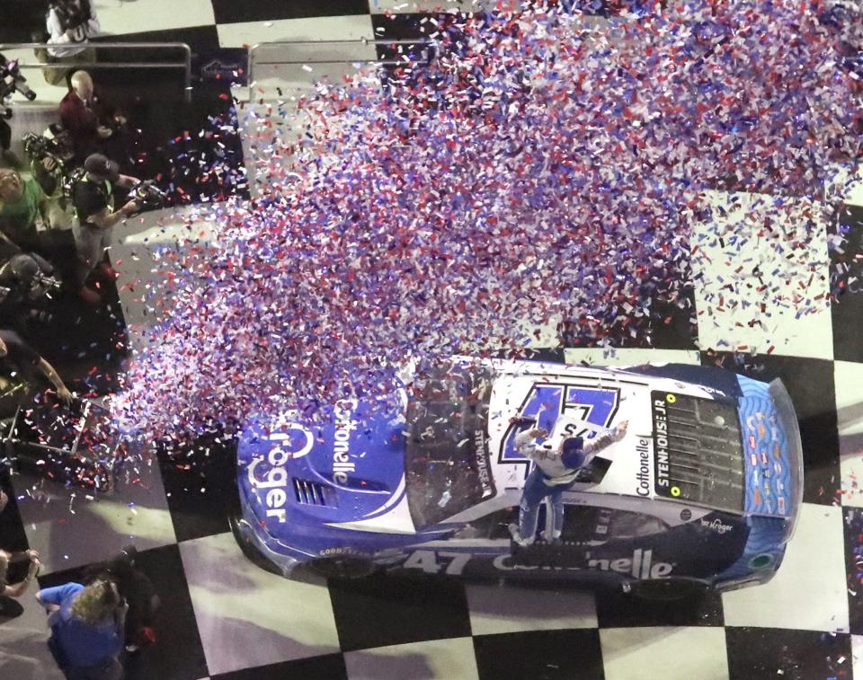 Ricky Stenhouse Jr. stands on his No. 47 Chevrolet in Victory Lane after winning the 2023 Daytona 500. NASCAR's "Great American Race" for 2024 is Sunday.
