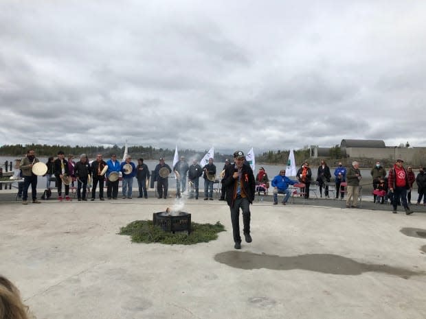 Dene National Chief Norman Yakeleya ends the feeding the fire ceremony in Somba K'e Park on a high note.